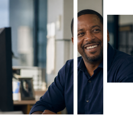Man smiling in an office setting after receiving positive legal guidance
