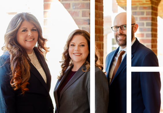 Three attorneys standing together outside a professional office building.
